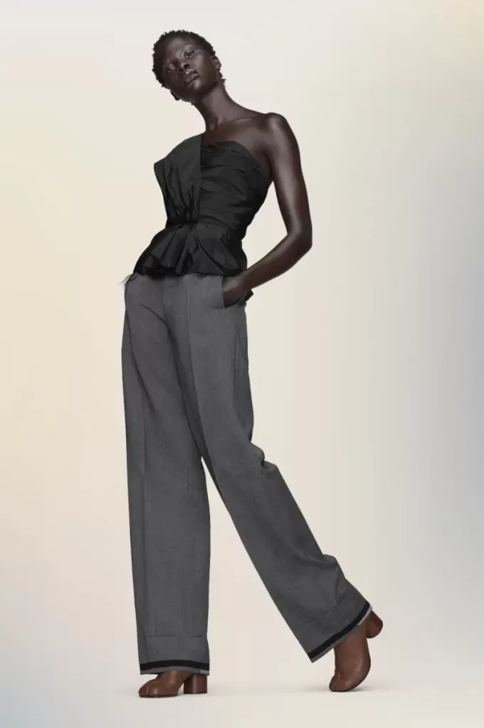 Asymmetrische gedrapeerde top