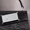 Gestolen handtas klein