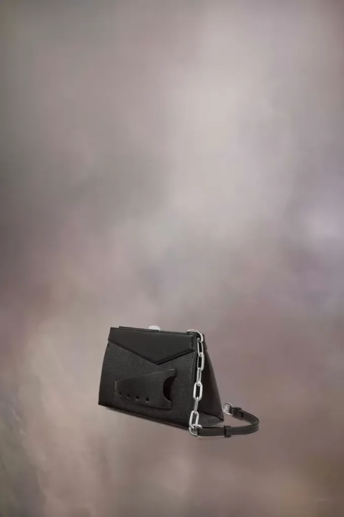 Kleine clutch met gesmokte schouder