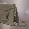 Kleine clutch met gesmokte schouder