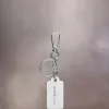 Vier steken sleutelhanger