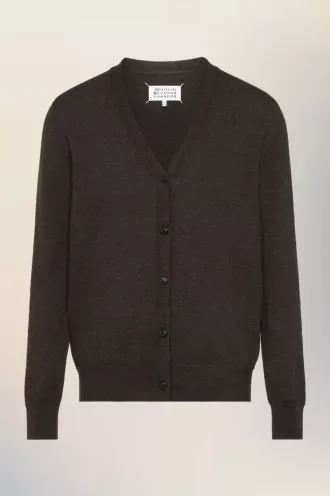 Wollen vest met elleboogstuk
