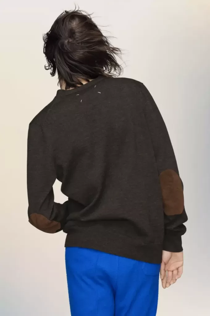Wollen vest met elleboogstuk